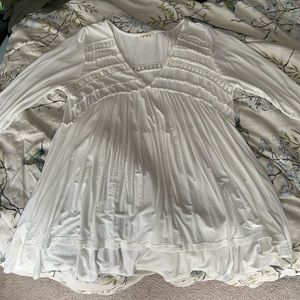 White long-sleeve ruffle top